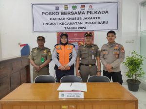 Pengamanan Gudang Logistik Pilkada Malam Hari, Kanit Intelkam Bersama Anggota Samapta Satpol. PP. Dan Dishub